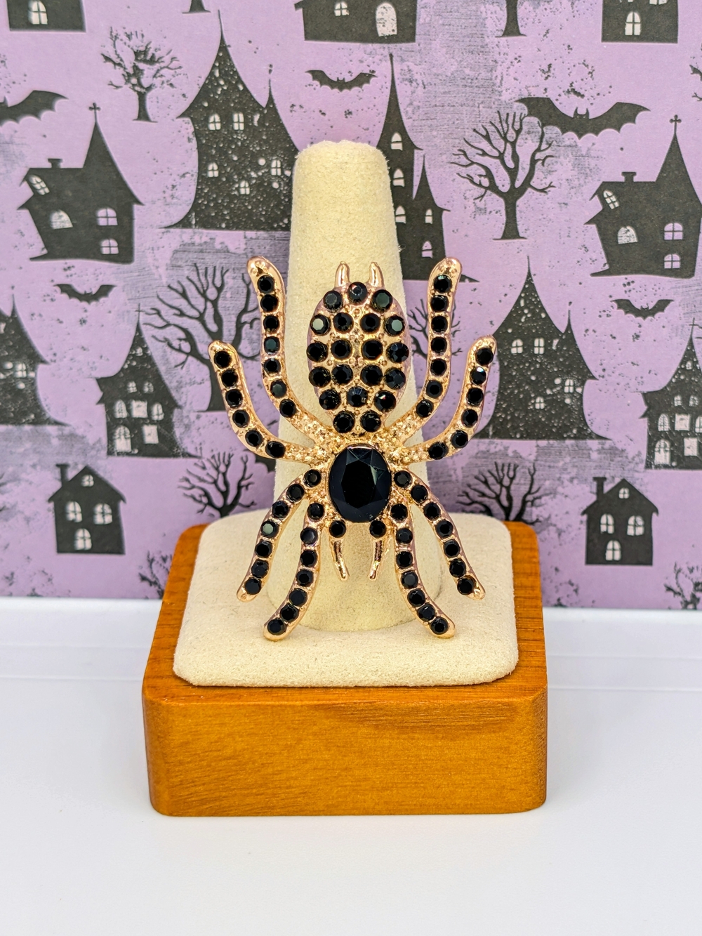 Gold-Tone Spider Brooch Accented with Black Rhinestones